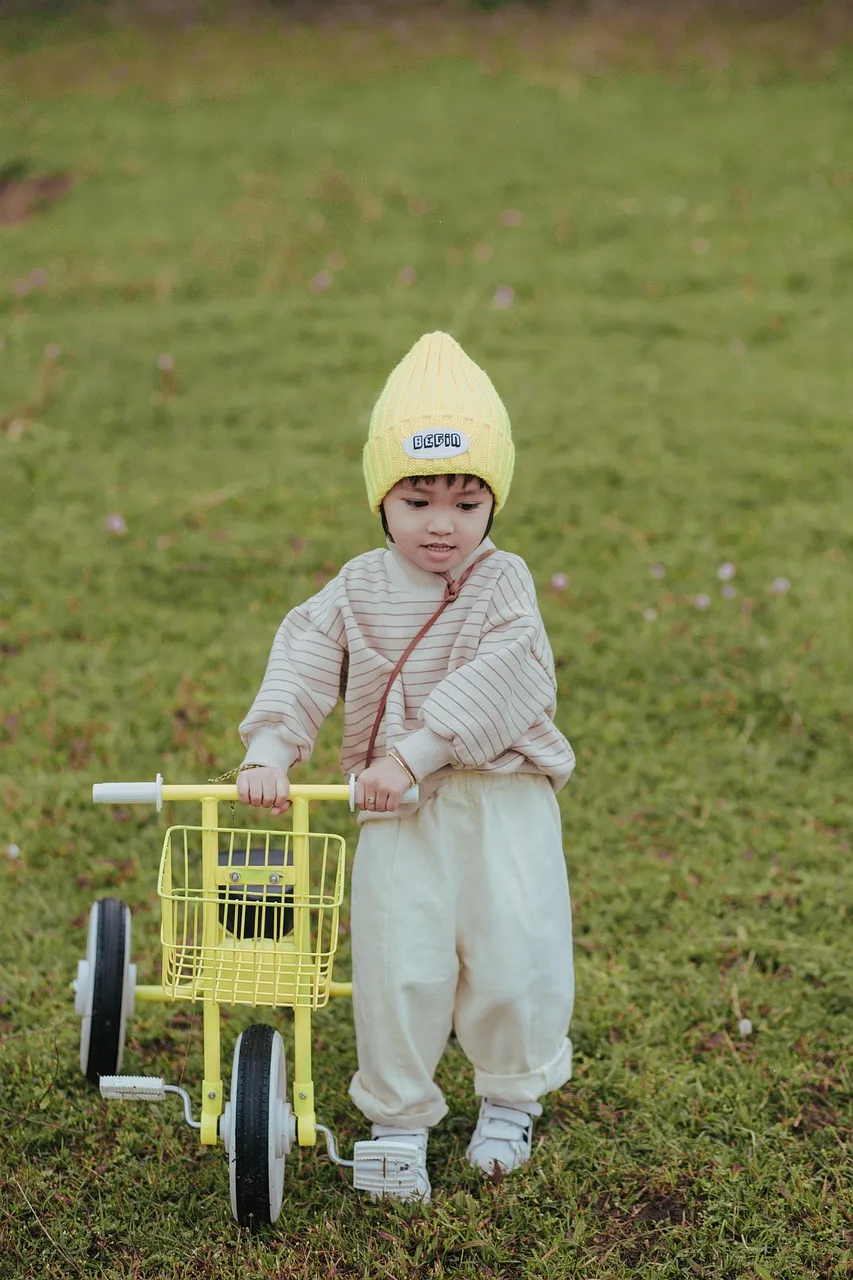 Father and child on a bike