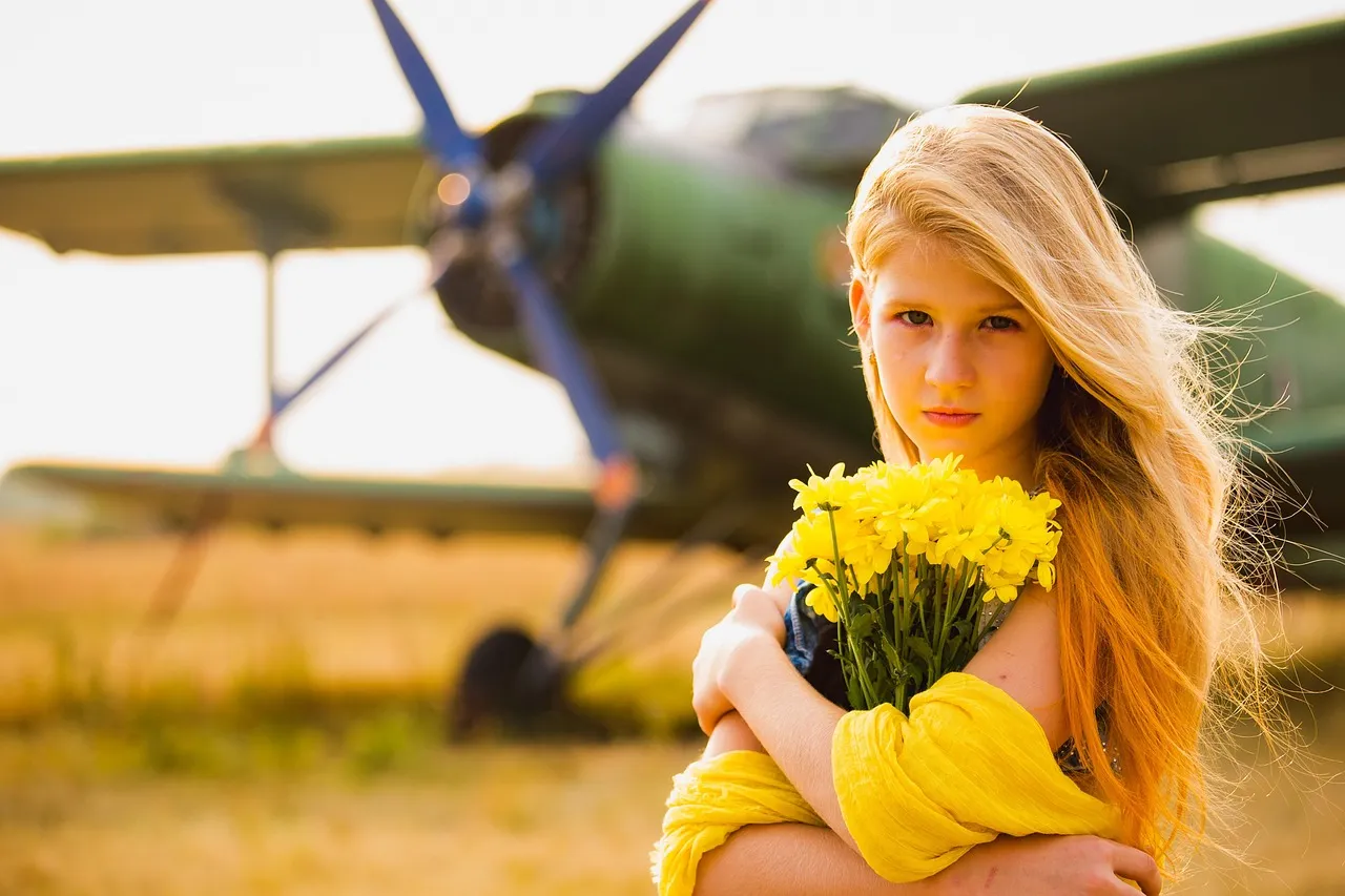 child holding pliers
