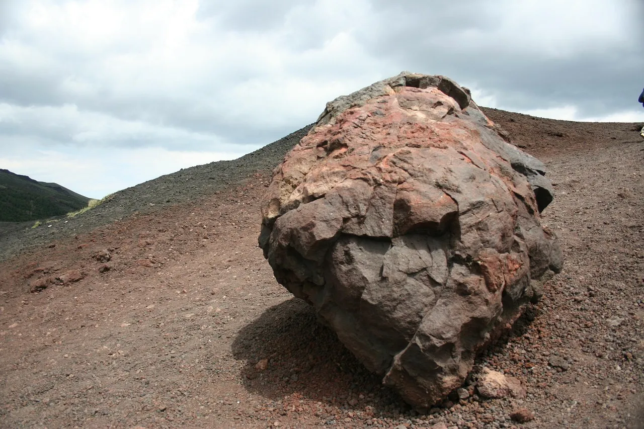 A closeup of the base of a DIY model volcano