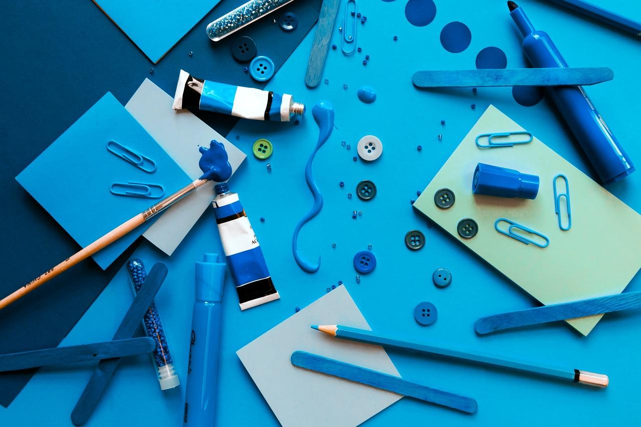 child making crafts with scissors