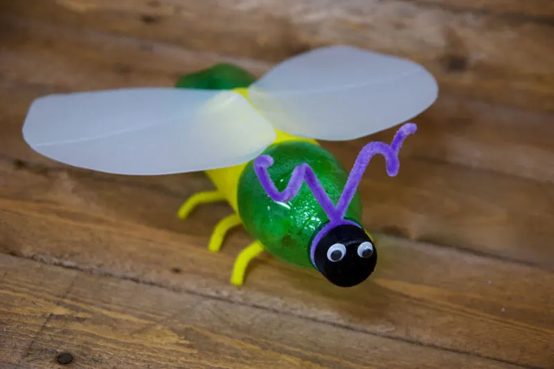 Recycled plastic bottle glow bug waiting for the glow stick to be added