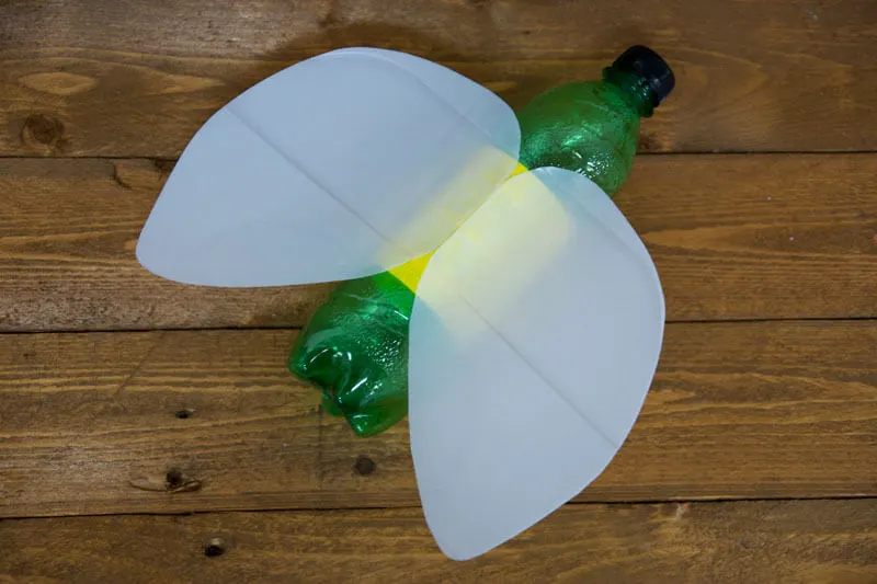 Top down view of a glow bug made from recycled plastic bottles