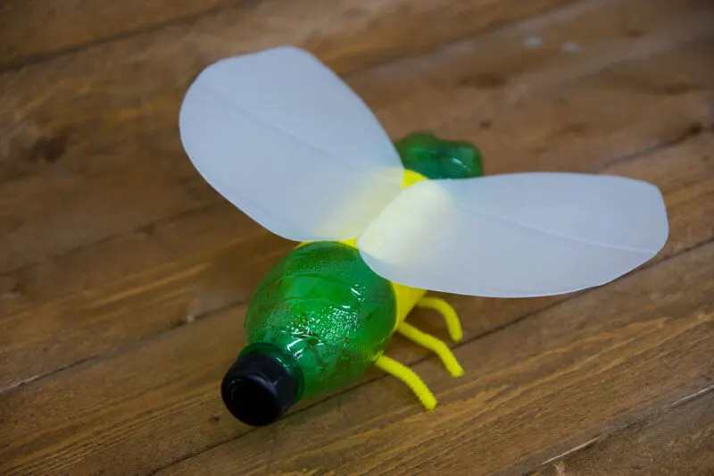 Final touches of a recycled plastic bottle glow bug